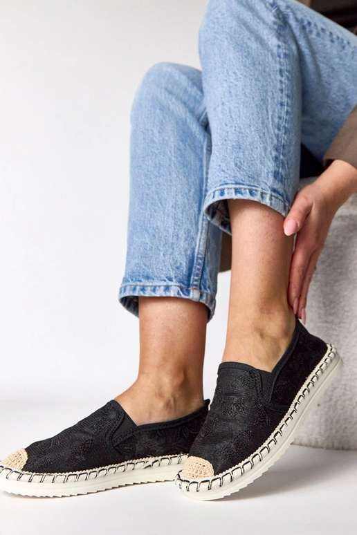 Zwarte espadrilles versierd met...