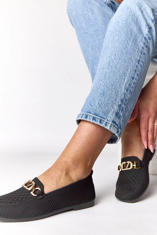 Zwarte textiele loafers met gouden...