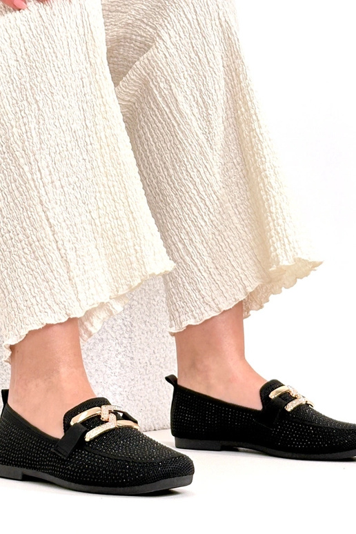 Zwarte mocassins versierd met...
