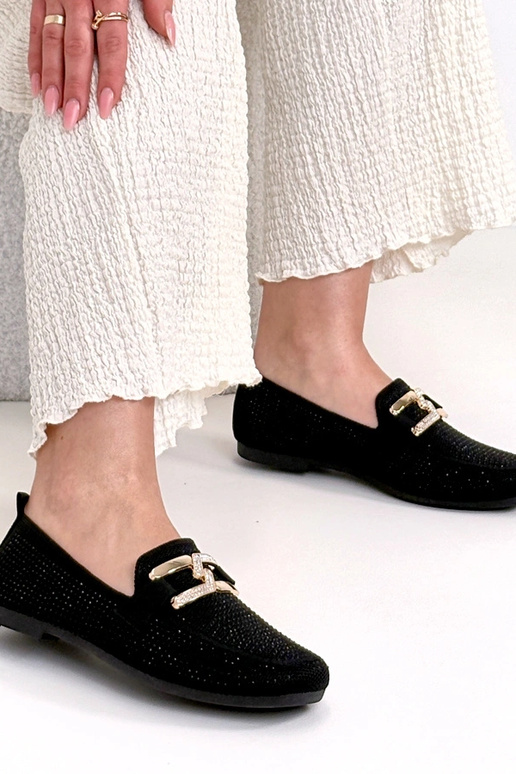 Zwarte mocassins versierd met...