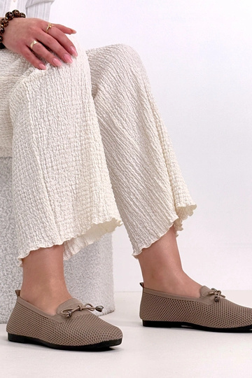 Donkerzandkleurige stoffen...