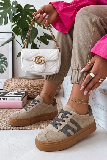 Beige leren sneakers met...