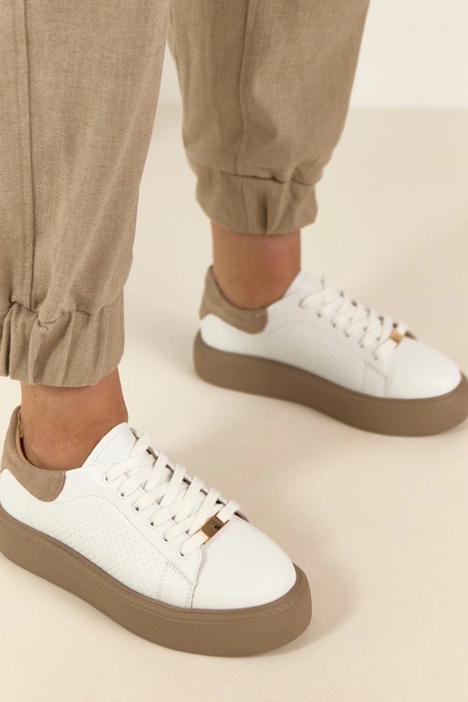 Witte leren sneakers met platform...