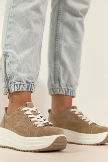 Beige leren sneakers met...