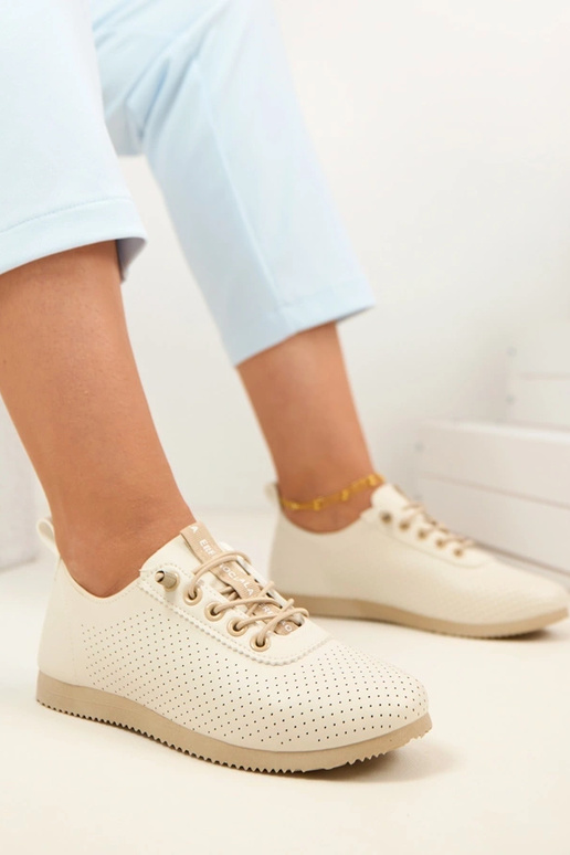 Zandkleurige geperforeerde lichte...