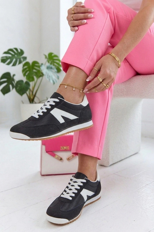 Zwarte sportschoenen met witte...