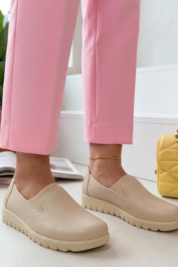 Zandkleurige instap...