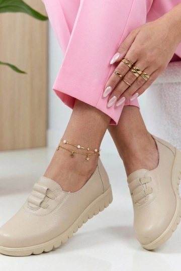 Zandkleurige instap...