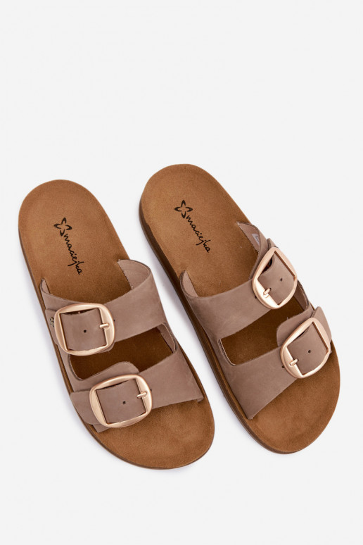 Leren slippers met gespen in zandkleur