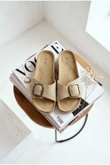 Zandkleurige nubuck dames slippers met gespen Emiline