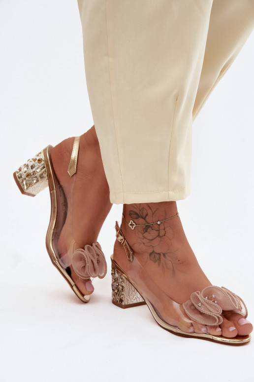 Transparante sandalen met hak en fonkelende stenen in goud
