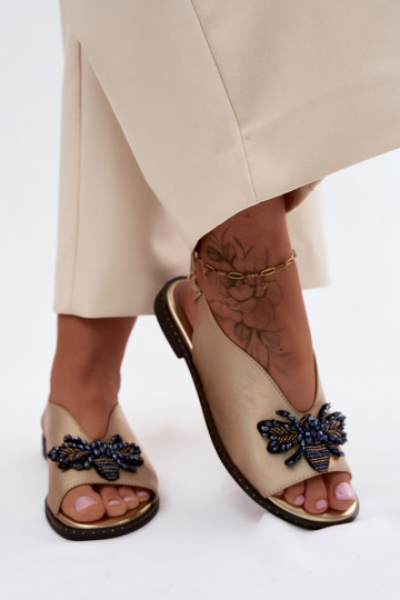 Sandalen met glans en ornamenten in vlak goud Russona