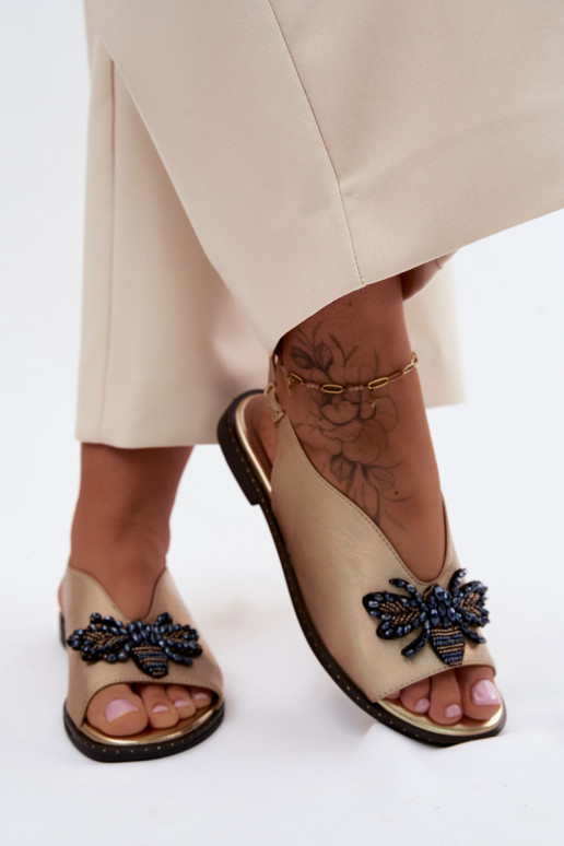 Sandalen met glans en ornamenten in vlak goud Russona