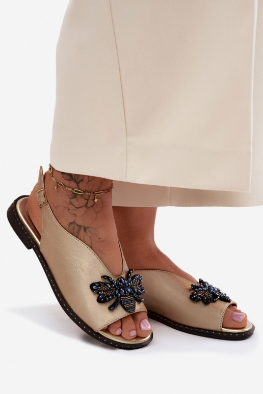 Sandalen met glans en ornamenten in vlak goud Russona