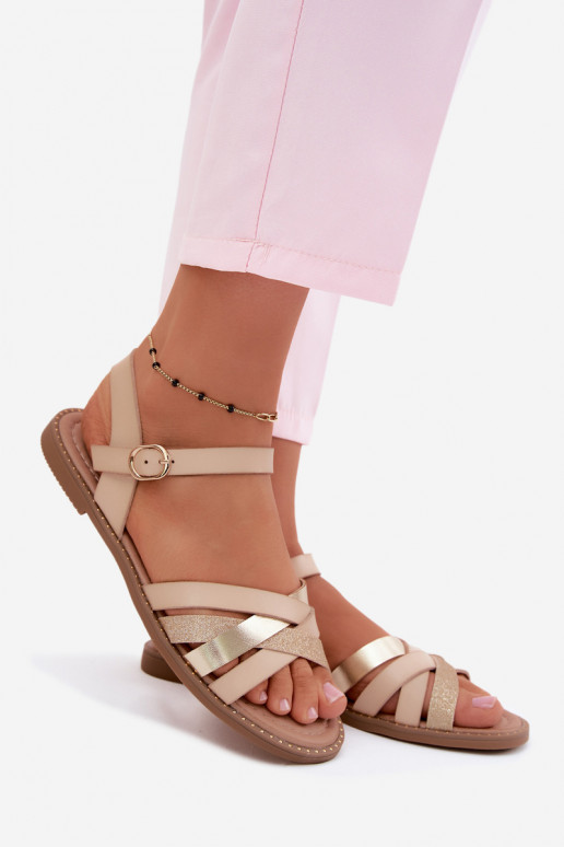 Vlakke dames sandalen met glans en banden in zandkleur Haden
