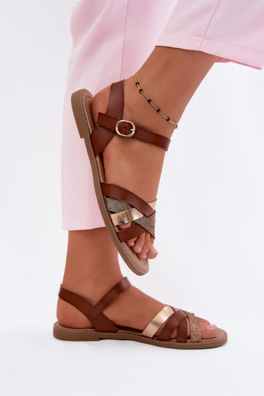Vlakke dames sandalen met glans en banden in bruin Haden