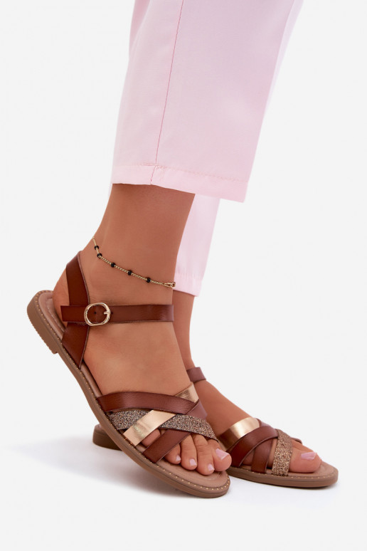 Vlakke dames sandalen met glans en banden in bruin Haden