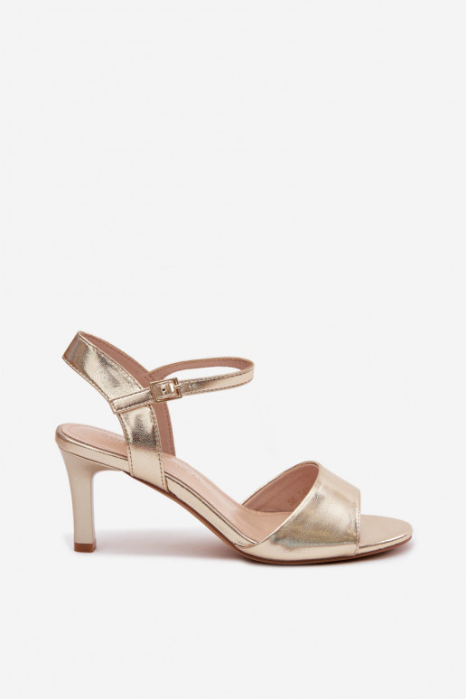Dames sandalen op een dunne hak in gouden kleur van Sergio Leone