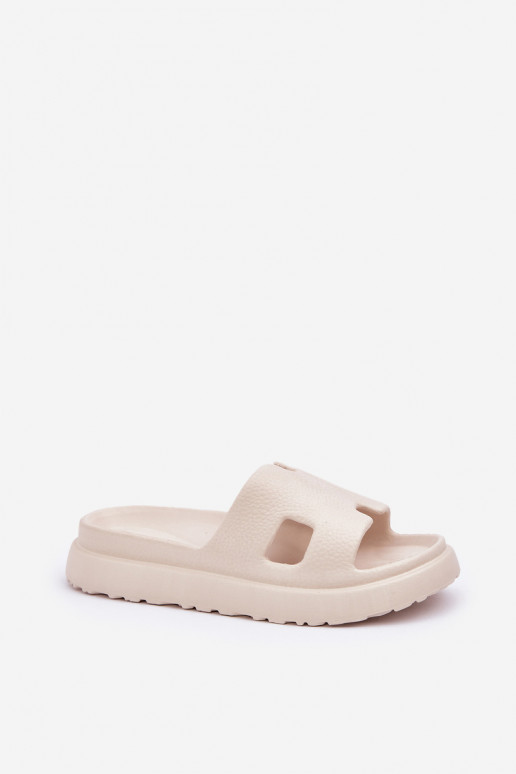 Ivoor kleurige lichte slippers met uitsparingen Neladith