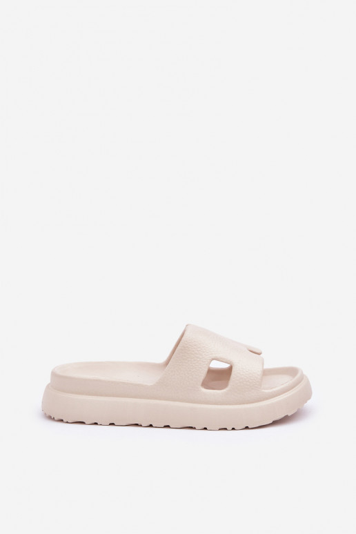 Ivoor kleurige lichte slippers met uitsparingen Neladith