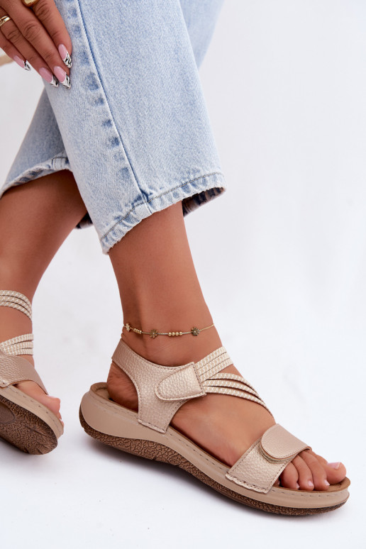 Gouden dames sandalen met elastische bandjes