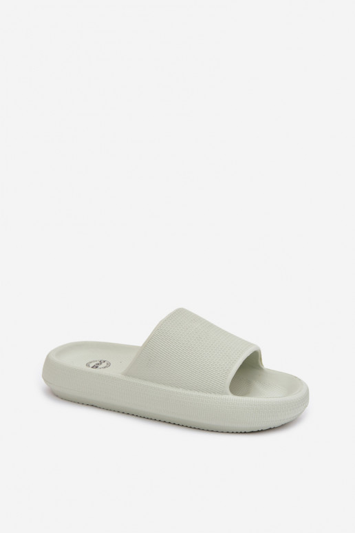 Dames lichte schuimslippers op dikke zool in muntkleur Querceria