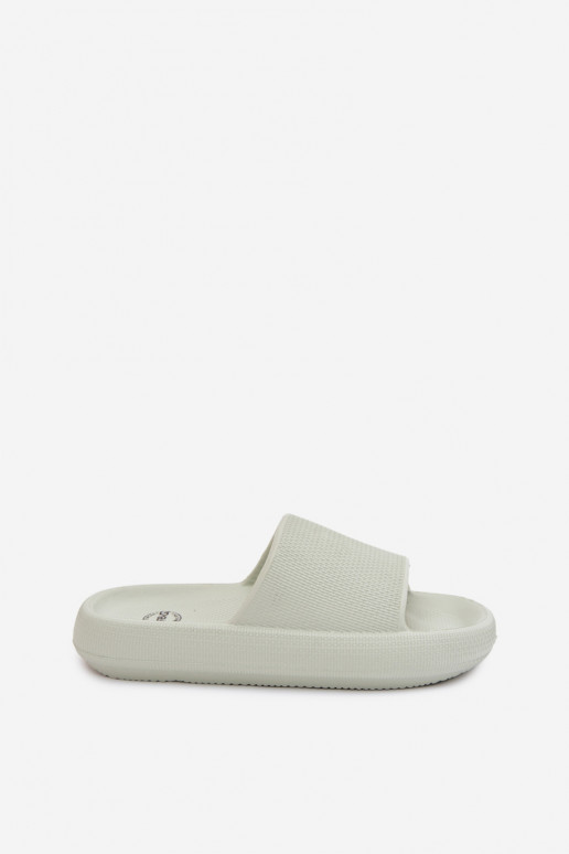Dames lichte schuimslippers op dikke zool in muntkleur Querceria