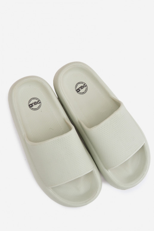 Dames lichte schuimslippers op dikke zool in muntkleur Querceria
