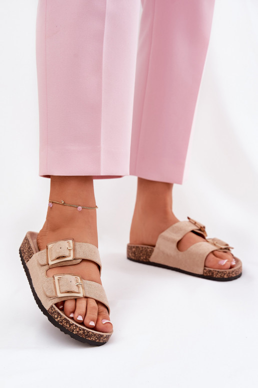 Dames slippers met gespen op een kurken zool in zand met hartjes