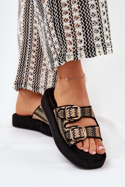 Dames slippers op een platform met gespen in zwart Limme