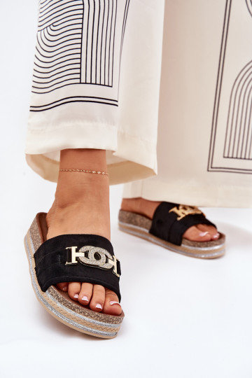 Dames slippers met details op een platform met glans in zwart Eanes