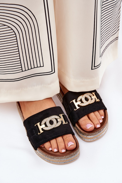 Dames slippers met details op een platform met glans in zwart Eanes