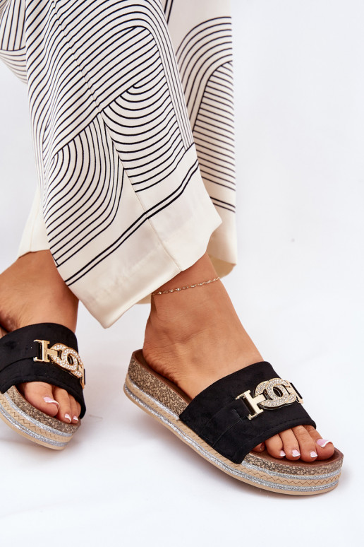 Dames slippers met details op een platform met glans in zwart Eanes