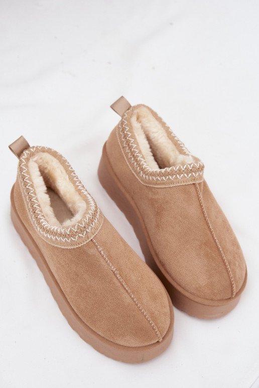 Lage sneeuwlaarzen in zandkleur met geborduurde bloemen en platform Taliah