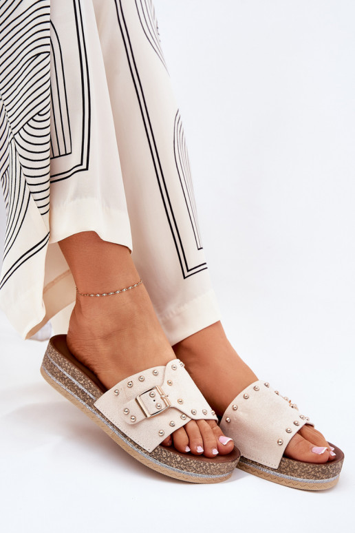 Dames slippers met platform, gespen en spikes in zand Nusithia