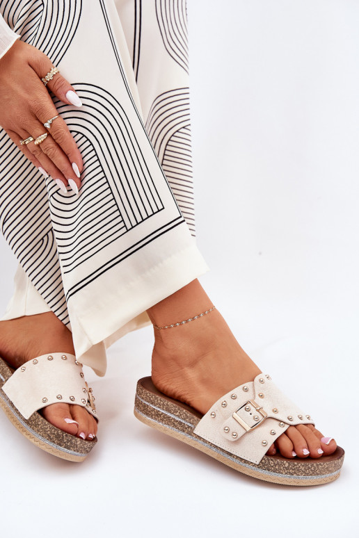 Dames slippers met platform, gespen en spikes in zand Nusithia