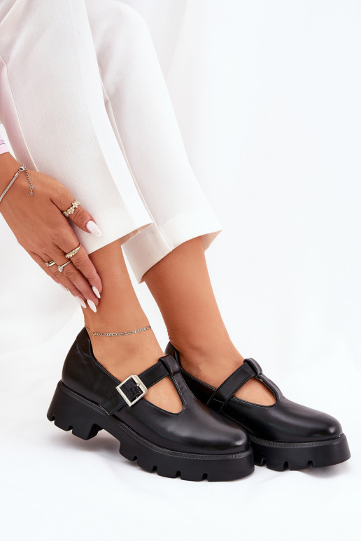 Zwarte dameschoenen met gespen op het platform Venda