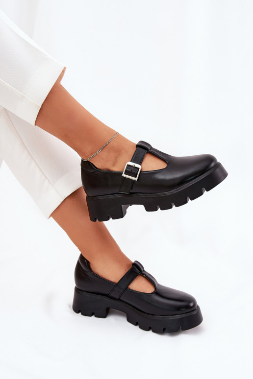 Zwarte dameschoenen met gespen op het platform Venda