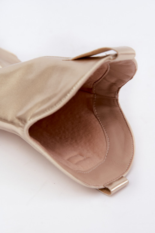 laarzen tot de knie in cowboystijl met hak in gouden kleur