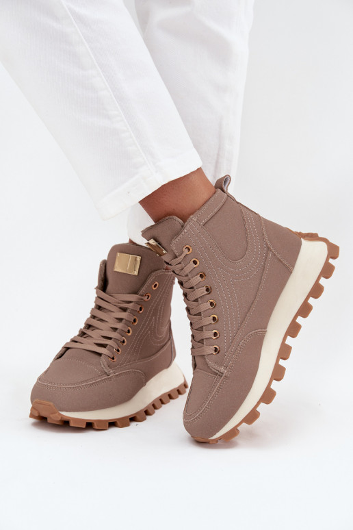 Geïsoleerde dames schoenen op platform Tai turirivira beige