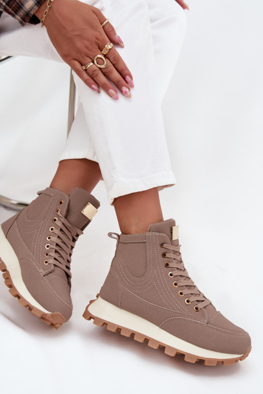 Geïsoleerde dames schoenen op platform Tai turirivira beige