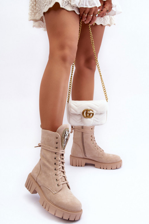 Sandkleurige faux suede enkellaarsjes met versieringen Tai turirx