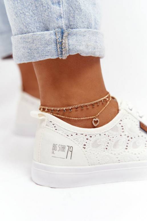 Witte sneakers met kantmotieven Witte sneakers met kantmotieven