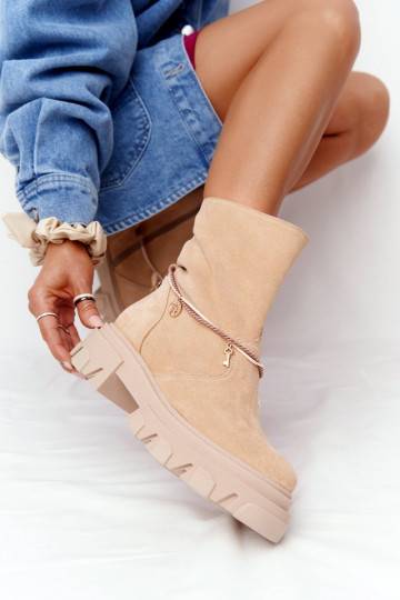 Grote beige suède laarzen