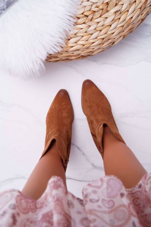 Dameslaarzen met hak in naturel suède... Dameslaarzen met hak in naturel suède...