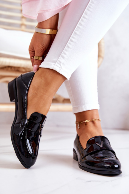 Schoenen met lakeffect in de zwarte... Schoenen met lakeffect in de zwarte...