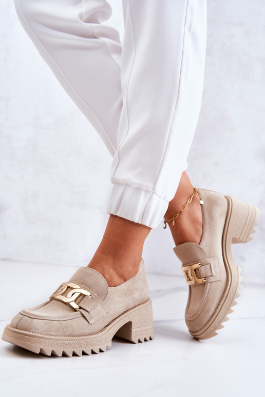 Ivoorkleurige suède schoenen met... Ivoorkleurige suède schoenen met...