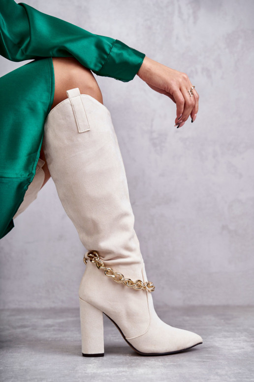 Verwarmde enkellaarsjes met kettingen... Verwarmde enkellaarsjes met kettingen...