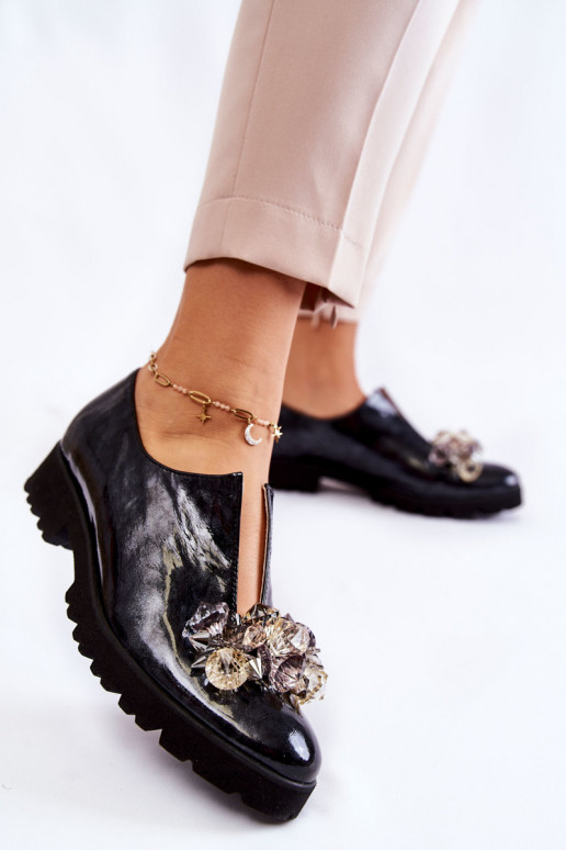 Damesschoenen met ornamenten en...