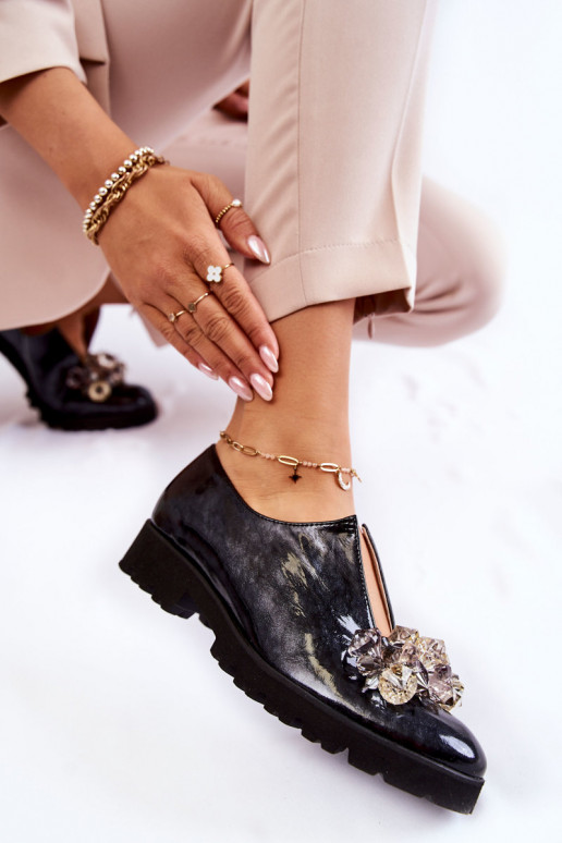 Damesschoenen met ornamenten en...